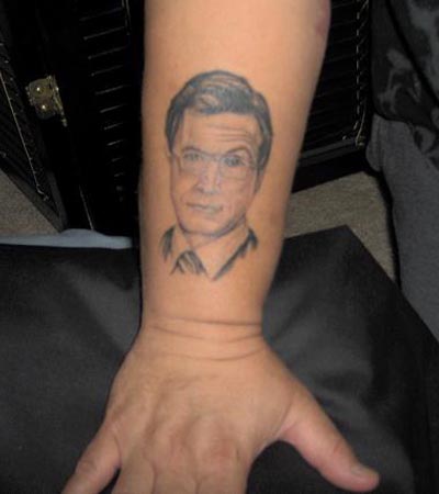 (source) Most of us find Steven Colbert funny, but to get his face tattooed 