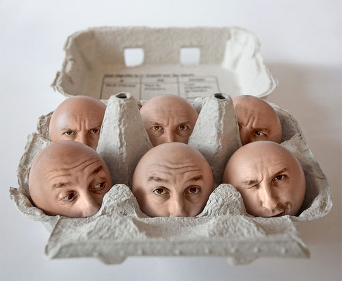Six Egg Faces In A Box. c/o Pierre Beteille. Posted in: Bizarre, Images
