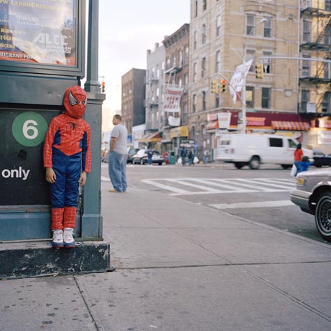 Hiding Behind A Corner Wearing A Spider-Man Costume