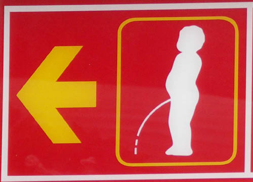 Sign For Manneken Pis Statue