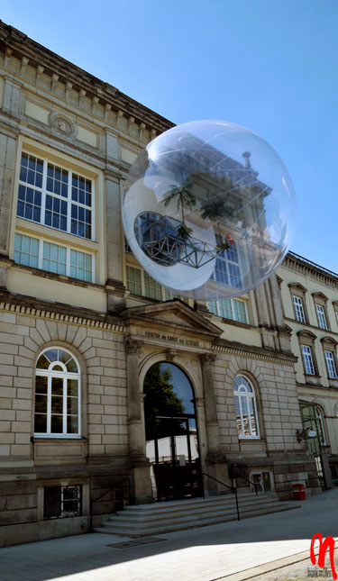 Climate Ball Capsule Off A Balcony