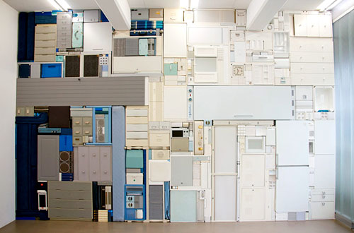 Wall of Stacked Furniture, Cabinets And Appliances