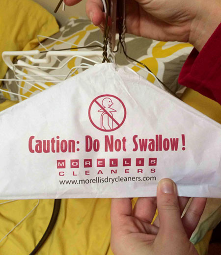 Bizarre Dry Cleaner Ad Clothes Hanger Warning: Do Not Swallow Chair