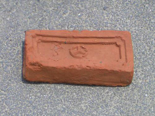 Brick With A Peace Symbol