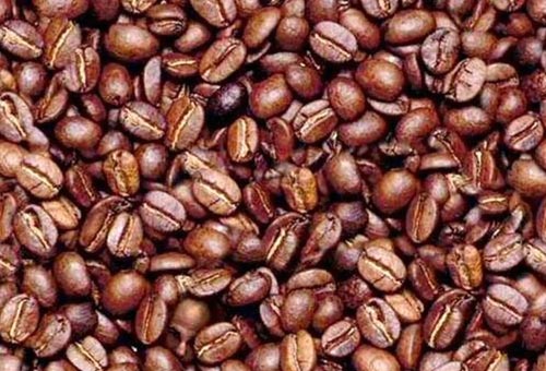 Mans Face In Coffee Beans