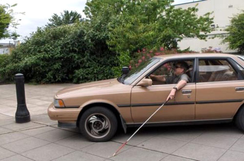 Blind Man Driving A Car