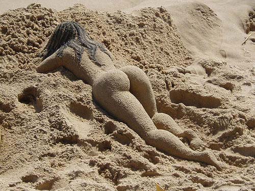 Sand Castle Of Womans Backside