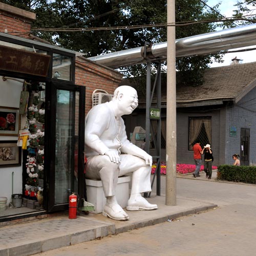 Big Sitting Man Sculpture In Beijing