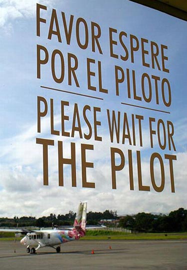 Please Wait For Pilot Airport Sign