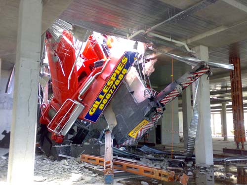 Crane Collapses Through Basement