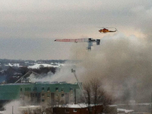 Helicopter Rescuing A Crane Operator
