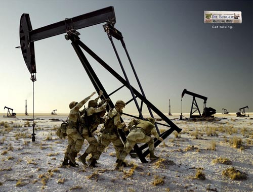 Picture Of Soldiers Righting An Oil Rig Mimicking Iwo Jima Flag Raising